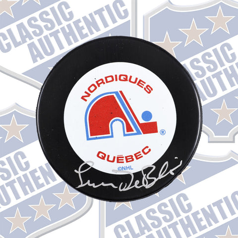 Lucien Deblois Quebec Nordiques autographed puck (#1897)