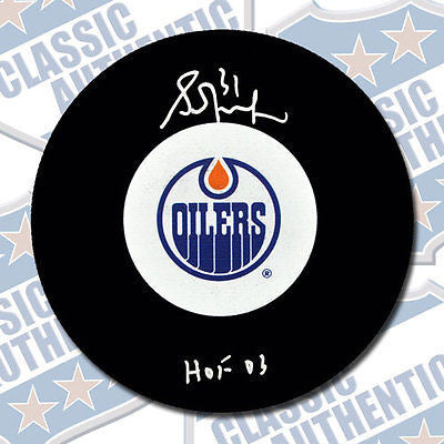 GRANT FUHR Edmonton Oilers autographed puck w/HOF (#1893)