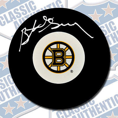 BUTCH GORING Boston Bruins autographed puck (#1825)