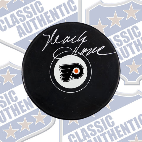 MARK HOWE Philadelphia Flyers autographed puck (#3210)