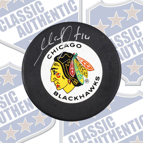 MICHEL GOULET Chicago Black Hawks autographed puck (#595)