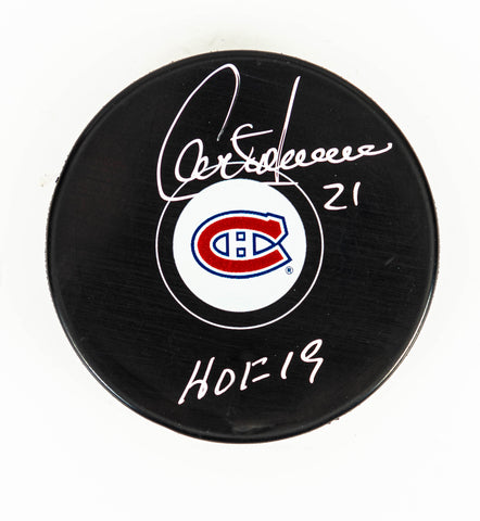 GUY CARBONNEAU Montreal Canadiens autographed puck w/HOF 19(#1879)