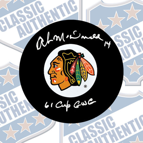 AB McDONALD Chicago Blackhawks autographed puck with Cup Inscription (#1788)