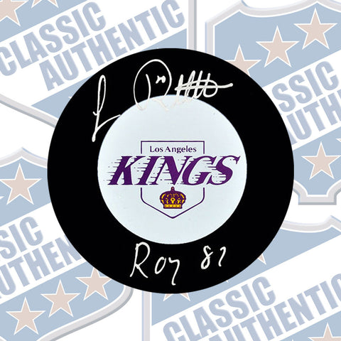 LUC ROBITAILLE Los Angeles Kings autographed puck w/ROY 87 (#1945)