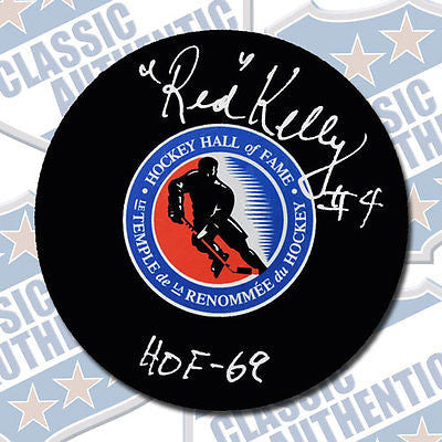 RED KELLY Hall of Fame autographed puck w/HOF (#2064)