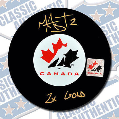 MEGHAN AGOSTA Team Canada autographed puck w/2x Gold (#1952)