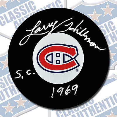 LARRY HILLMAN Montreal Canadiens autographed puck w/Cup (#1935)