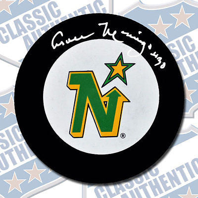 CESARE MANIAGO Minnesota North Stars autographed puck (#1829)