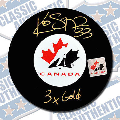 KIM ST-PIERRE Team Canada autographed puck w/3x Gold (#1931)