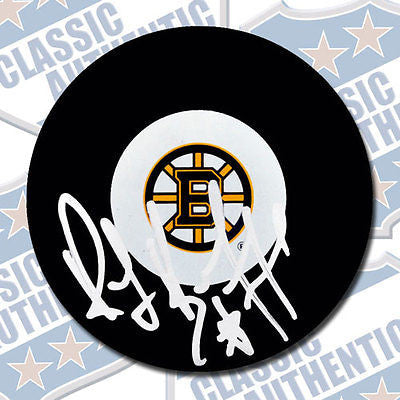 RAYMOND BOURQUE Boston Bruins autographed puck (#1995)