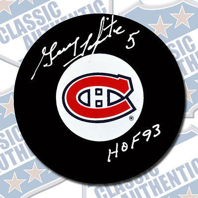 GUY LAPOINTE Montreal Canadiens autographed puck w/HOF (#1874)