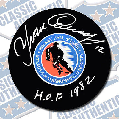YVAN COURNOYER Hall of Fame autographed puck w/HOF (#2645)