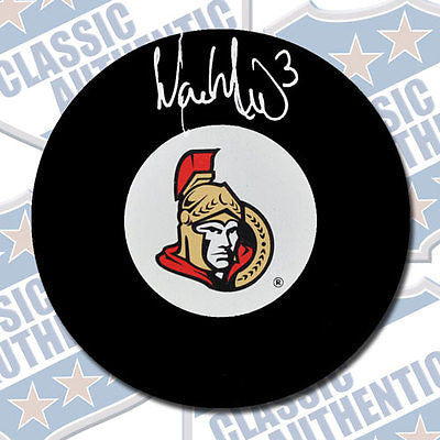 MARC METHOT Ottawa Senators autographed puck (#1965)