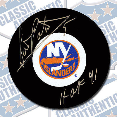 DENIS POTVIN New York Islanders autographed puck w/HOF (#3099)