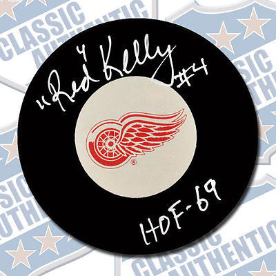 RED KELLY Detroit Red Wings autographed puck w/HOF (#2015)