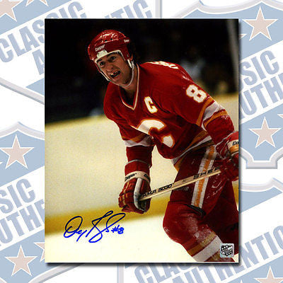 DOUG RISEBROUGH Calgary Flames autographed 8x10 photo (#2911)