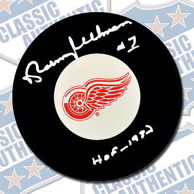 NORM ULLMAN Detroit Red Wings autographed puck w/HOF (#1968)