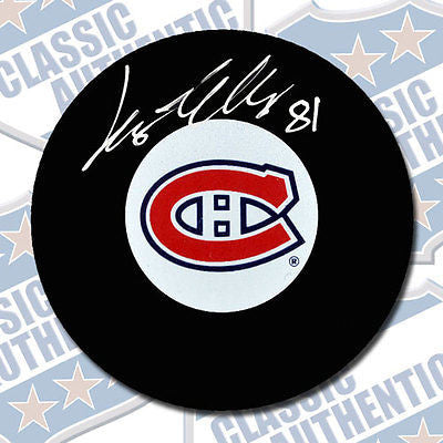 LARS ELLER Montreal Canadiens autographed puck (#1930)
