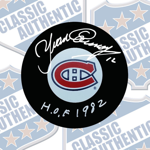 YVAN COURNOYER Montreal Canadiens autographed puck w/HOF (#2640)