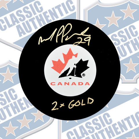 MARIE-PHILIP POULIN Team Canada autographed puck with Inscription (#3419)
