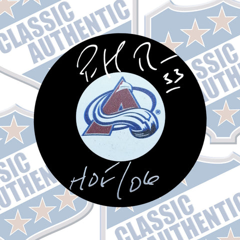 PATRICK ROY Colorado Avalanche autographed puck w/HOF (#3581)