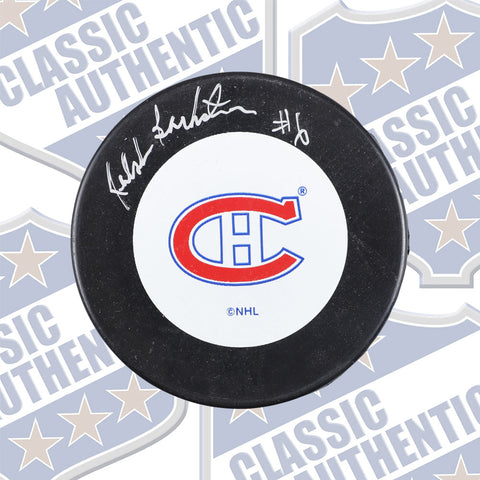 RALPH BACKSTROM Montreal Canadiens autographed puck (#613)