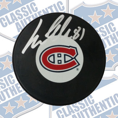 LARS ELLER Montreal Canadiens autographed puck (#665)