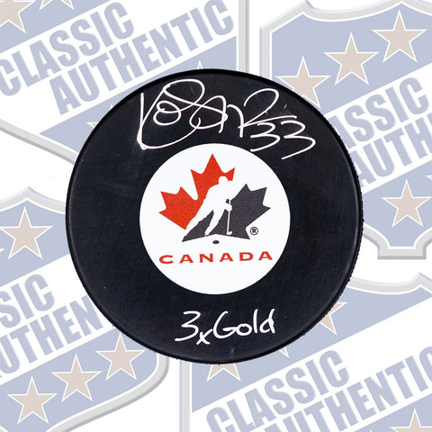 KIM ST-PIERRE Team Canada autographed puck w/3x Gold (#1931a)
