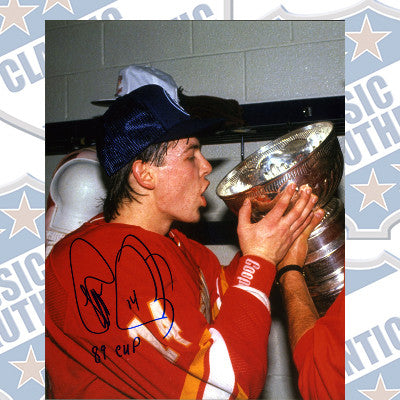 THEO FLEURY Calgary Flames autographed 8x10 photo (#5004)