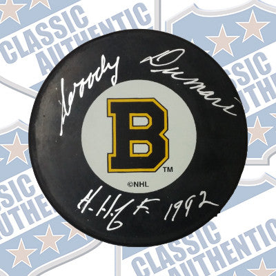 WOODY DUMART Boston Bruins autographed puck (#700)